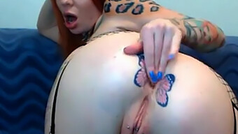 Tattooed Masturbation With A Redhead